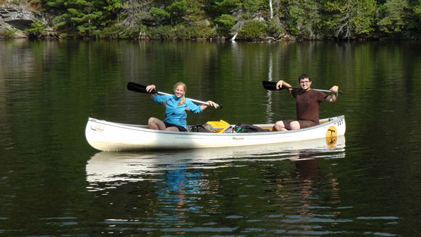 Photo of two students in a canoe participating in MOOSE