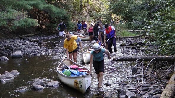 Photo of students doing a portage participating in MOOSE